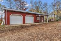 3 Car detached garage with electrical, insulated and attached hot tub pad and water well