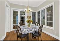 Eat in kitchen with windows that roll out.  Virtually staged! After staging.