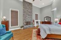 Beautiful stone fireplace in the master bedroom!