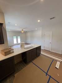 Current status as of 6/23/2025. Kitchen. Will include stainless steel appliances(Fridge, Stove, oven, microwave, and dishwasher).