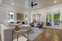 Family Room with wood ceiling and access to the screen porch
