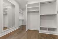 HUGE primary closet with custom shelving