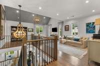 Upper landing Very inviting.   Plenty of room here for a game room or pool table.