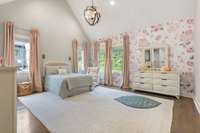 Bedroom with vaulted ceiling and great hardwood floors.