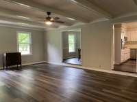 Cozy den open to dining room and kitchen....freshly painted!