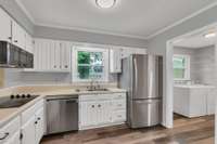 Huge laundry room just off the kitchen.