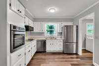 New stainless appliances in kitchen.
