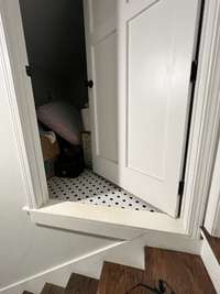 Utility Room but it's a little full of stuff.   It has washer and dryer hookups but currently used for storage space.