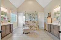 This beautiful primary bathroom has just been remodeled. The stand alone tub was removed and is in the attic should someone want to put it back in the bathroom.