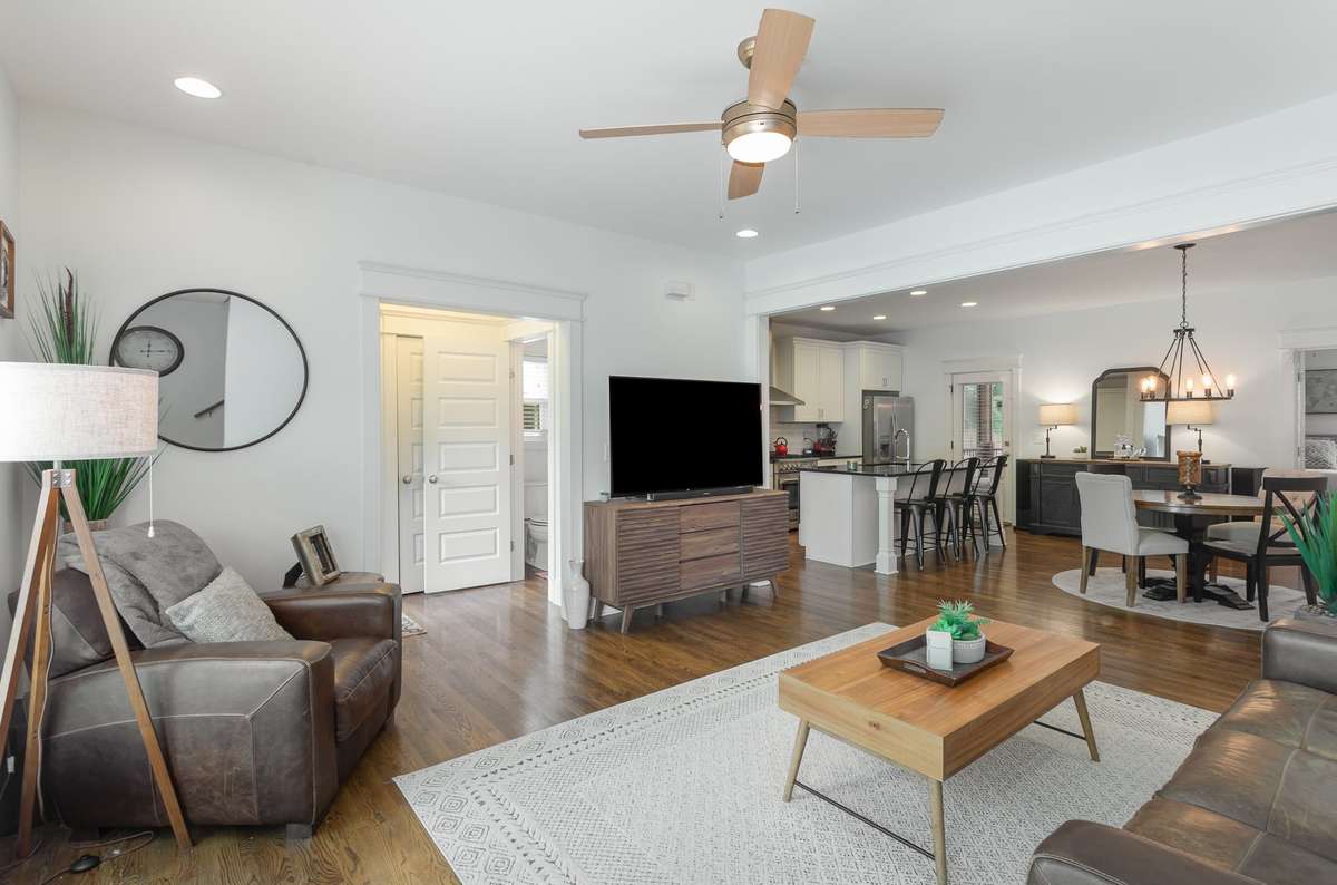 When you enter the home, you’re welcomed into a foyer with a conveniently located half bath just off the entry.