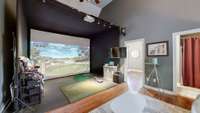 The seller's used this room with a golf simulator that is negotiable with the sale This makes a great space to entertain.