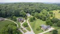 Tucked back in edge of the woods and surrounded by beautiful homes, this home offers lots of privacy and on a dead-end street.