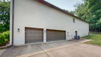3 car garage and a private entrance to the downstairs area