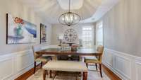 Dining room with trey ceiling.