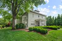 Spectacular curb appeal and surrouding grounds