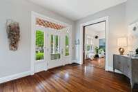 A leaded glass front door and gleaming hardwood floors are just the beginning of original details you'll find throughout this home