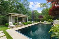 The pool house has a large storage room and bathroom