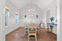 Spacious dining room with lots of natural light flowing thru.