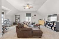 Bonus room over garage. Large enough for a study area.
