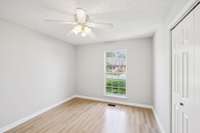 2nd bedroom has a large closet and a ceiling fan.