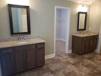Dual vanities y'all, not just dual but separated, no worries about someone encroaching on your valuable real estate!