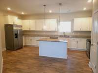 Looking into the kitchen from the dining room.