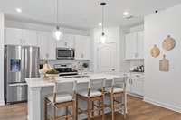 *Photo taken of Model Home. Selections & Colors may vary*