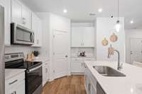*Photo taken of Model Home. Selections & Colors may vary*