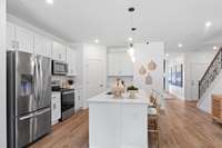 *Photo taken of Model Home. Selections & Colors may vary*