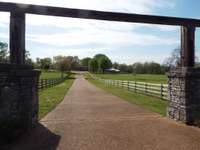 grand entrance with landscaping