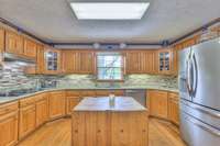 stainless appliances remain- portable butcher block island does not remain