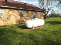 propane tank remains-serves garage only
