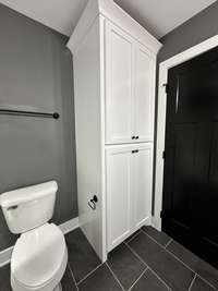 Cabinets inside primary bath for extra storage