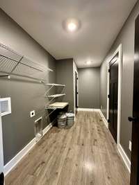 Laundry with pantry and lots of storage