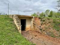 Storm shelter behind the home.