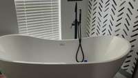 Separate Freestanding Tub and Shower in Primary Suite.