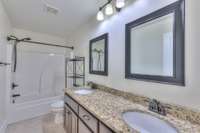 2nd full bath with granite countertops and double sinks