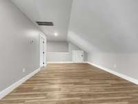 Loft area perfect for playroom or media room