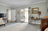 The sitting room/bonus area upstairs opens to the observation deck overlooking the beautiful sprawling back yard.