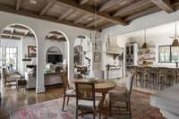 Enjoy an Open and accessible format, however the arches create a sense of defined spaces.