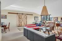 This separate office retreat is perfect for people who work from home and prefer some separation from the living areas of the home. It is also perfect as a future "mother-in-law" or private guest suite with its own private entrance and garage access