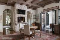 Enjoy casual dining by the raised wood burning (gas optional) fireplace.