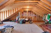 Huge storage or expansion space off the upstairs sitting room, plumbed and ready to easily create 2 additional bedrooms.