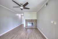 Living room with wood-burning fireplace