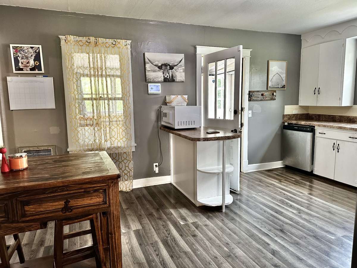 Eat-in kitchen  with Stainless refrigerator and Dishwasher.