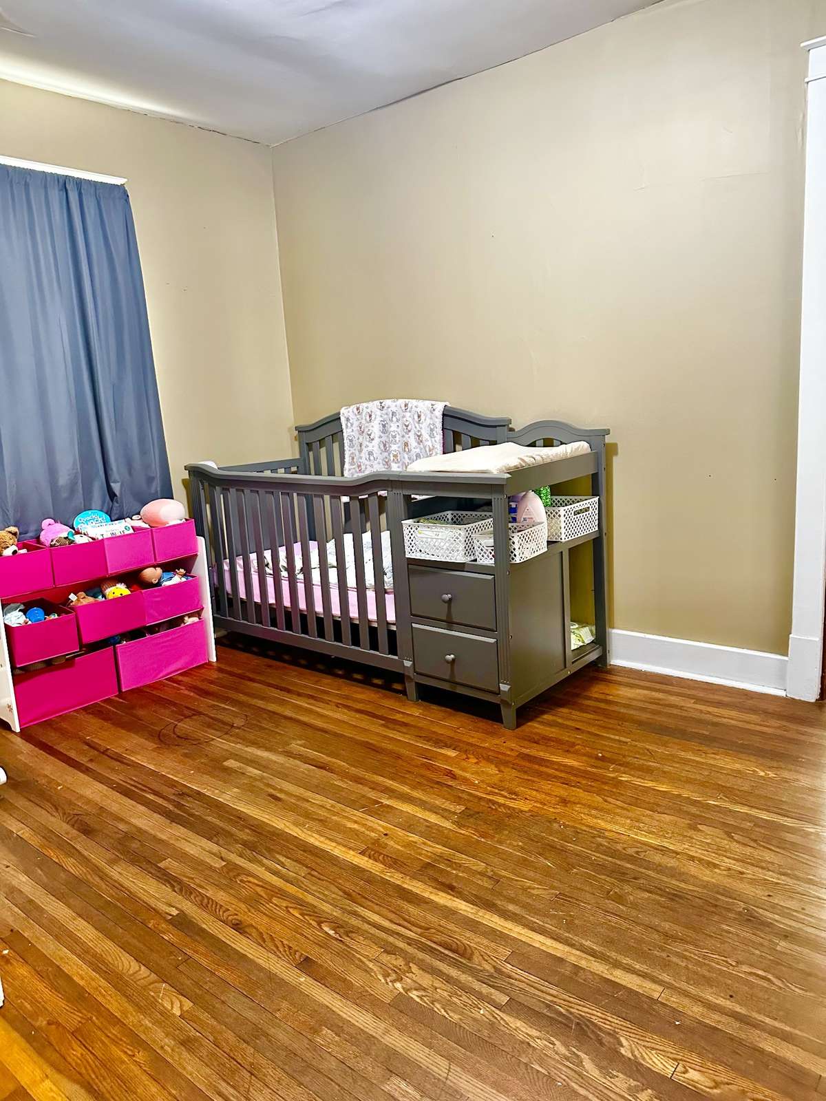 3rd Bedroom with closet and window featuring Hardwood Floors
