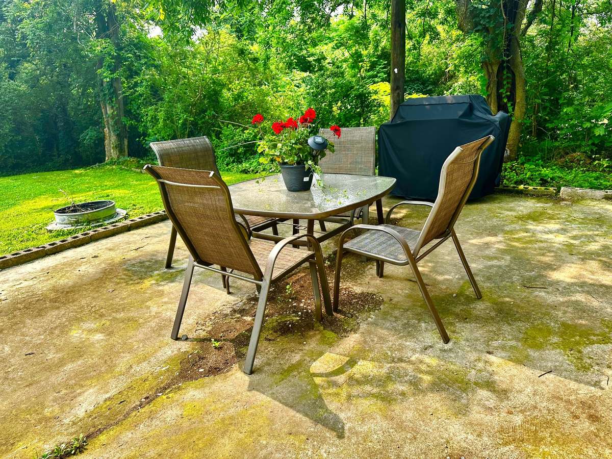 Wonderful Back yard concrete Patio for Grilling and entertaining!
