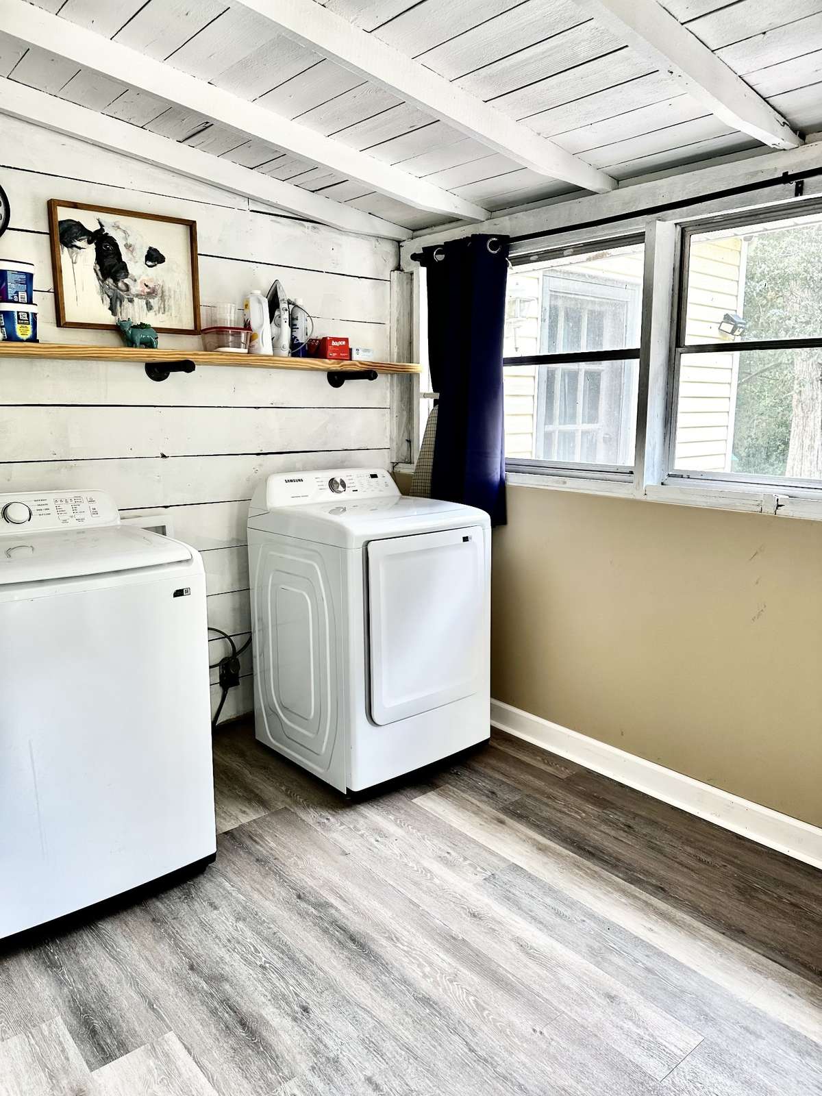 Large Laundry Room Room with plenty of room for a folding table  and or Boot Bench with entry to the kitchen and outside Deck.