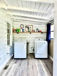 Laundry/Mud Room with plenty of room for a folding Table and or a Boot Bench