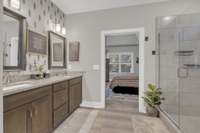 Plenty of space in the primary on-suite for a couple to get ready at the same time each morning.